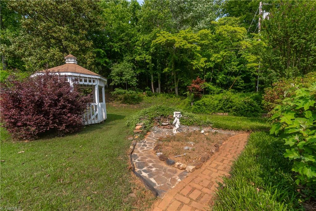 289 Reeves Mill Road Mount Airy, NC 27030 - Photo 9 of 50 Gazebo and water feature in backyard.