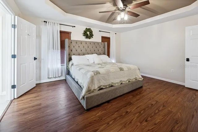 a bathroom with double vanity sink a mirror and vanity