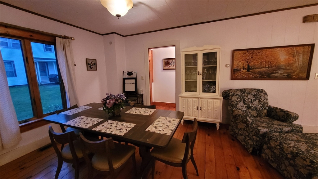 50 Grove Street Barre, MA 01005 - Photo 15 of 39 a view of a dining room with furniture and wooden floor