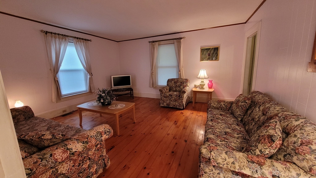 50 Grove Street Barre, MA 01005 - Photo 17 of 39 a living room with furniture and a flat screen tv
