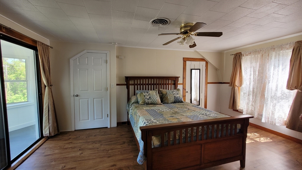 50 Grove Street Barre, MA 01005 - Photo 24 of 39 a bedroom with a bed and a window