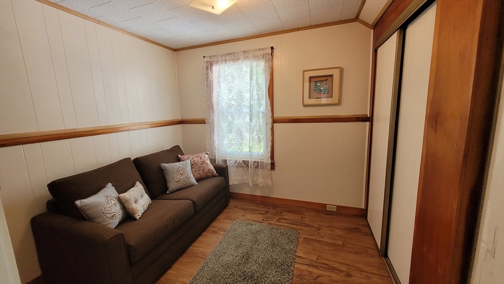50 Grove Street Barre, MA 01005 - Photo 30 of 39 a living room with furniture and a window