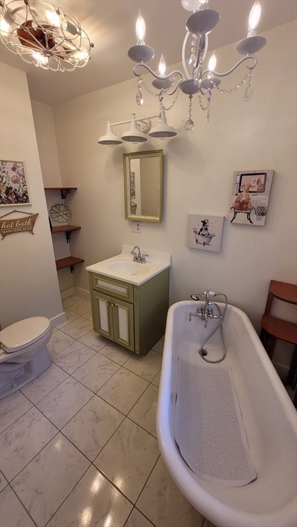 50 Grove Street Barre, MA 01005 - Photo 34 of 39 a spacious bathroom with a double vanity sink and a mirror