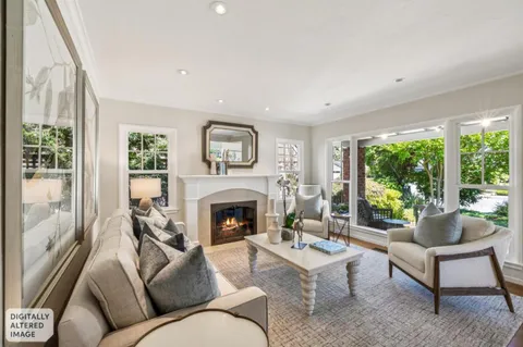 a living room with furniture and view of living room