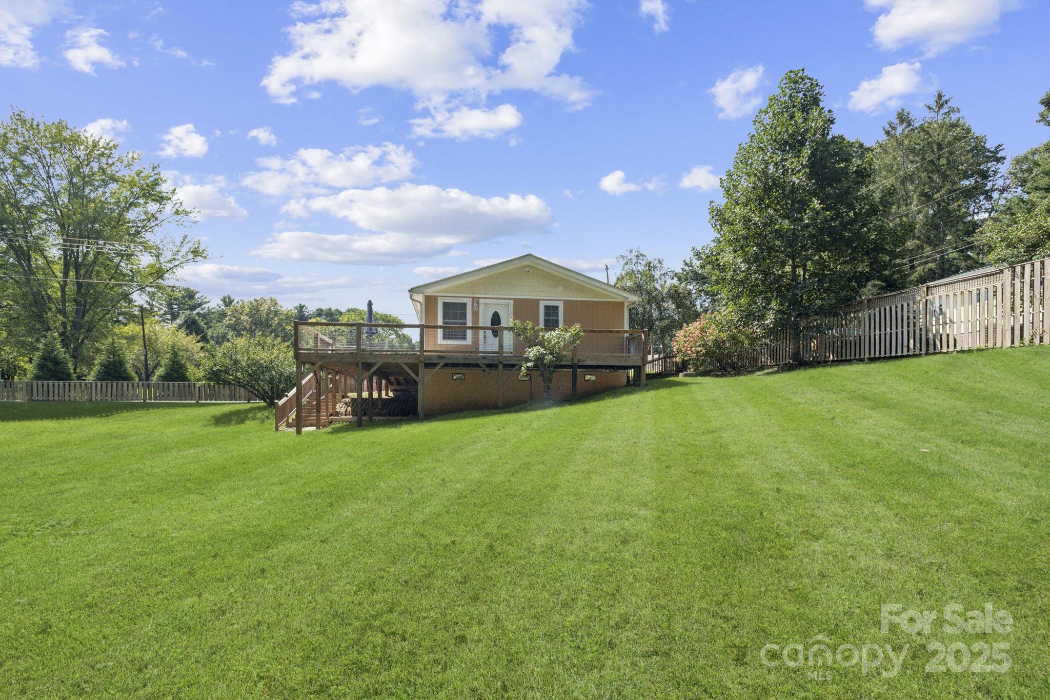660 Pace Road Hendersonville, NC 28792 - Photo 13 of 31 a front view of a house with garden