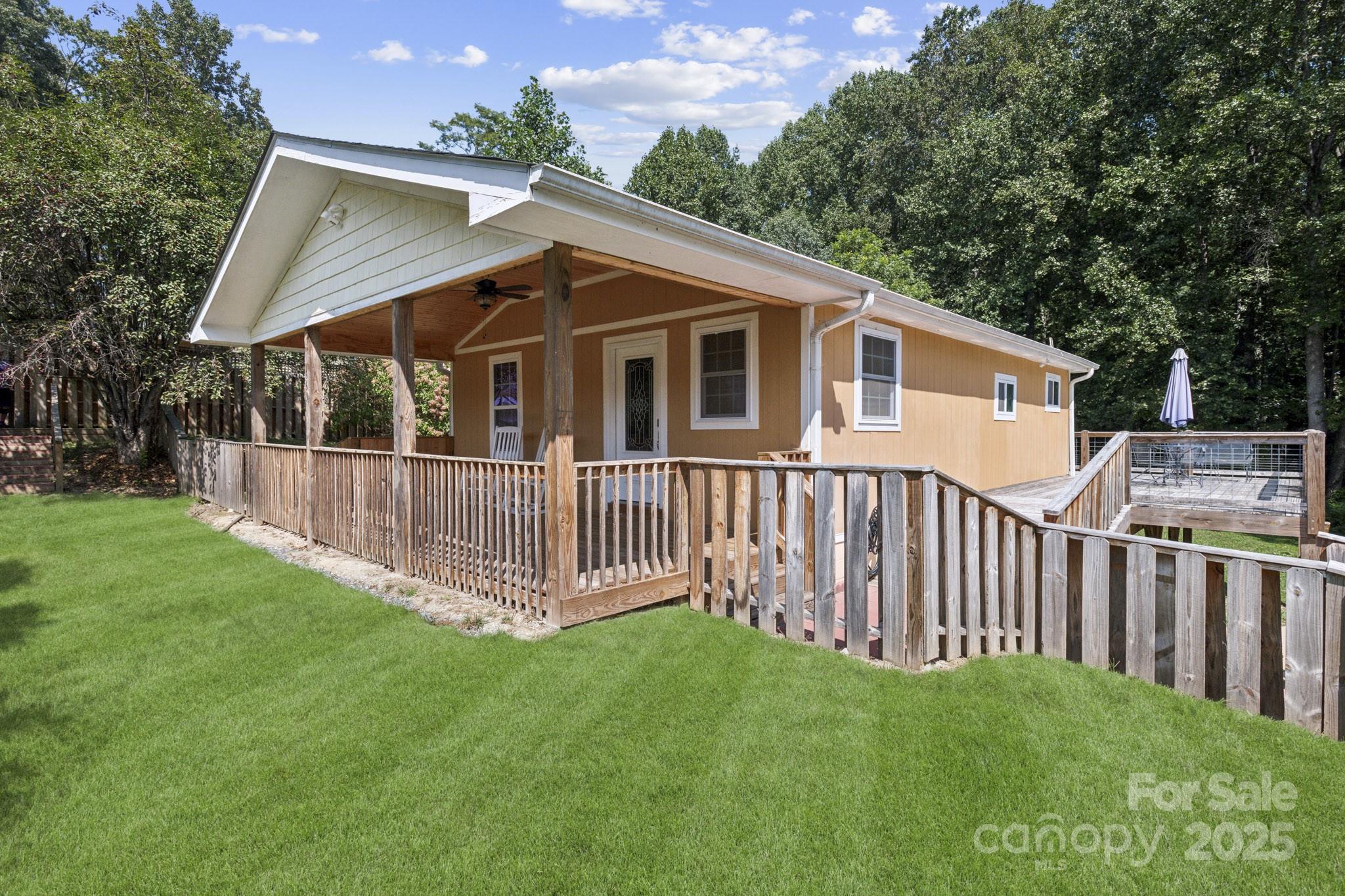 660 Pace Road Hendersonville, NC 28792 - Photo 17 of 31 a front view of a house with a yard