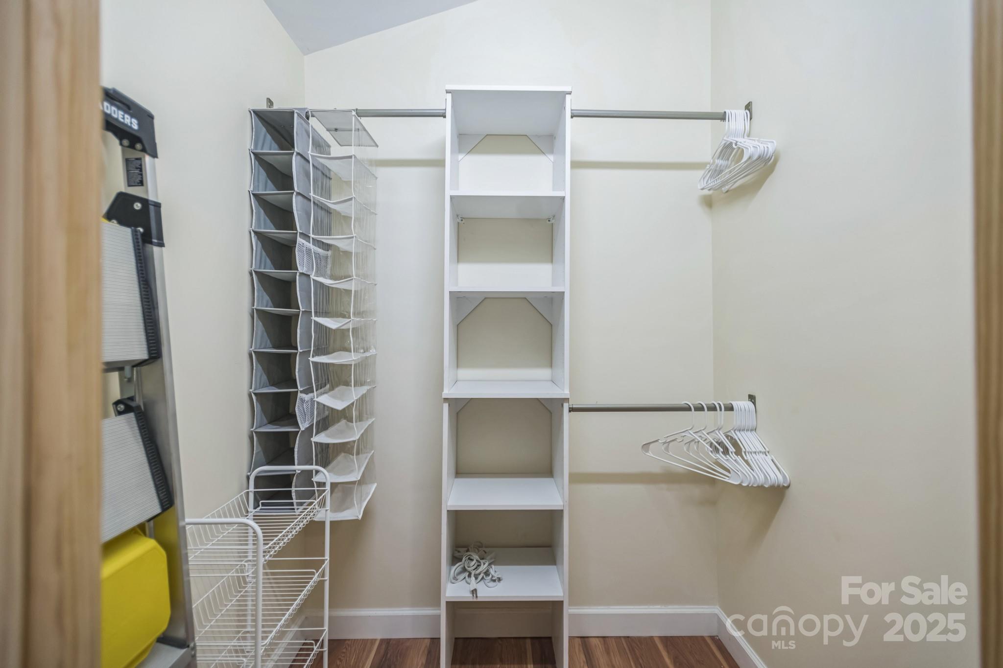 660 Pace Road Hendersonville, NC 28792 - Photo 9 of 31 a view of walk in closet with empty racks