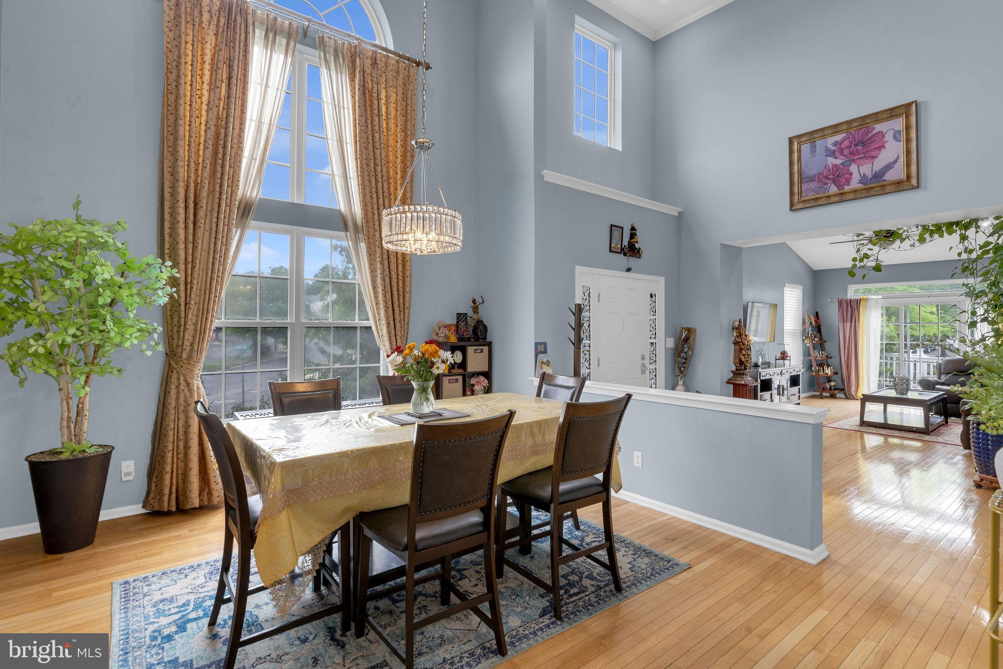 16 Cardiff Court Princeton Junction, NJ 08550 - Photo 13 of 60 a view of a dining room with furniture and wooden floor