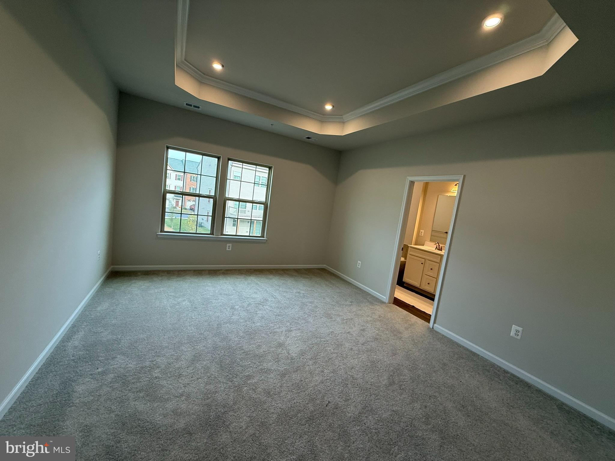 7891 Brandy Station Road Hanover, MD 21076 - Photo 14 of 25 Spacious main bedroom with elegant tray ceiling.