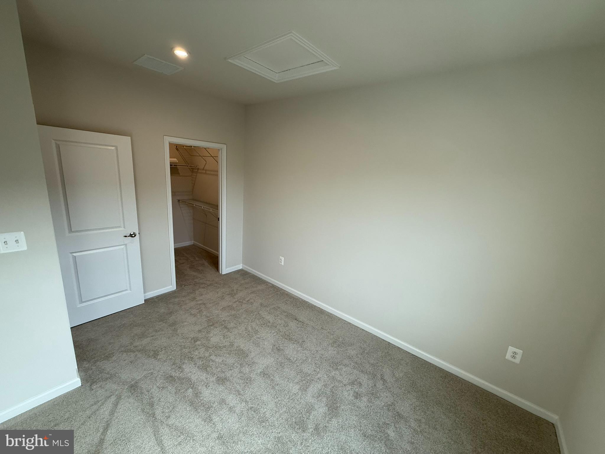 7891 Brandy Station Road Hanover, MD 21076 - Photo 16 of 25 Spacious room with soft, inviting tones.