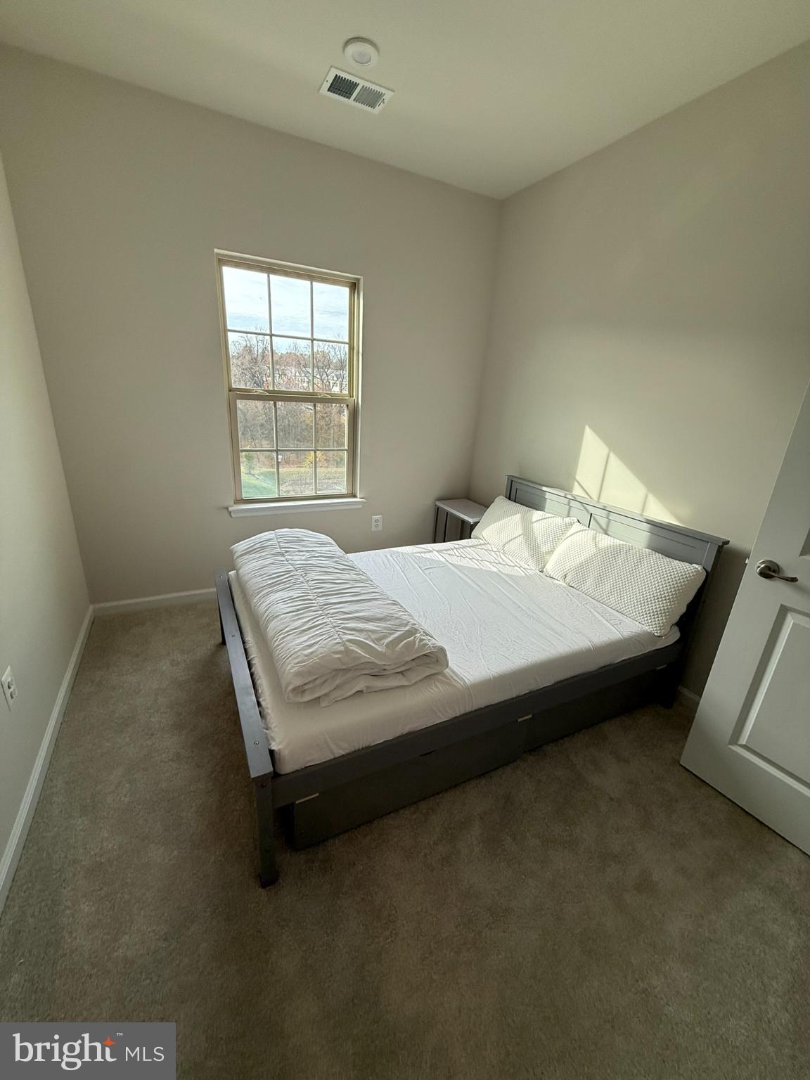 7891 Brandy Station Road Hanover, MD 21076 - Photo 17 of 25 Bedroom with natural light and views.