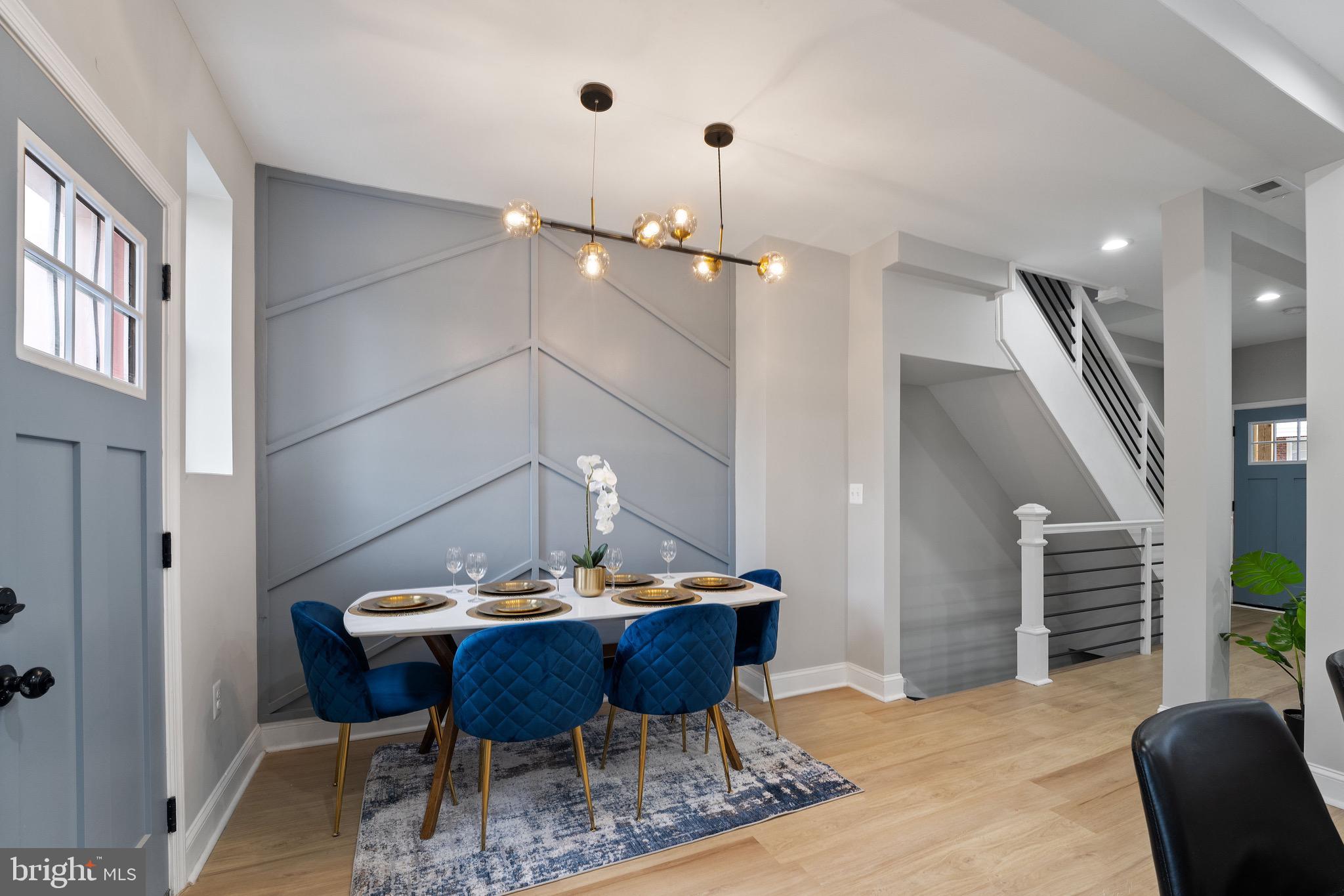 655 Dumbarton Avenue Baltimore, MD 21218 - Photo 7 of 28 a view of a dining room with furniture