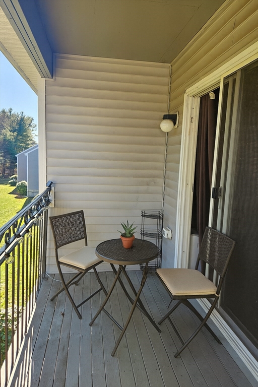 124 Tennis Plaza Road, Unit 22 Dracut, MA 01826 - Photo 9 of 9 a outdoor space with furniture
