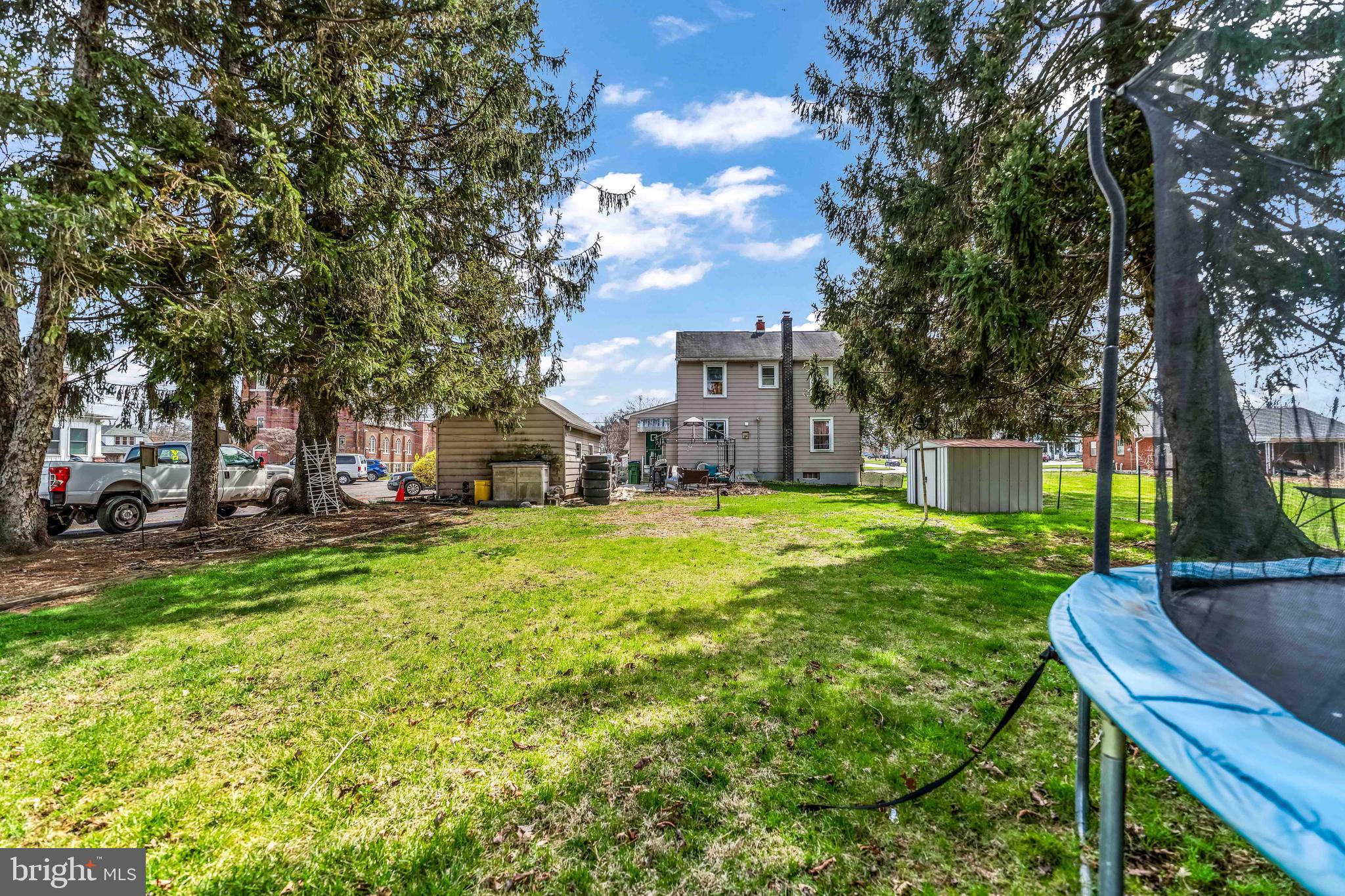 136 Linglestown Road Harrisburg, PA 17110 - Photo 21 of 25 a view of yard with swimming pool and trees