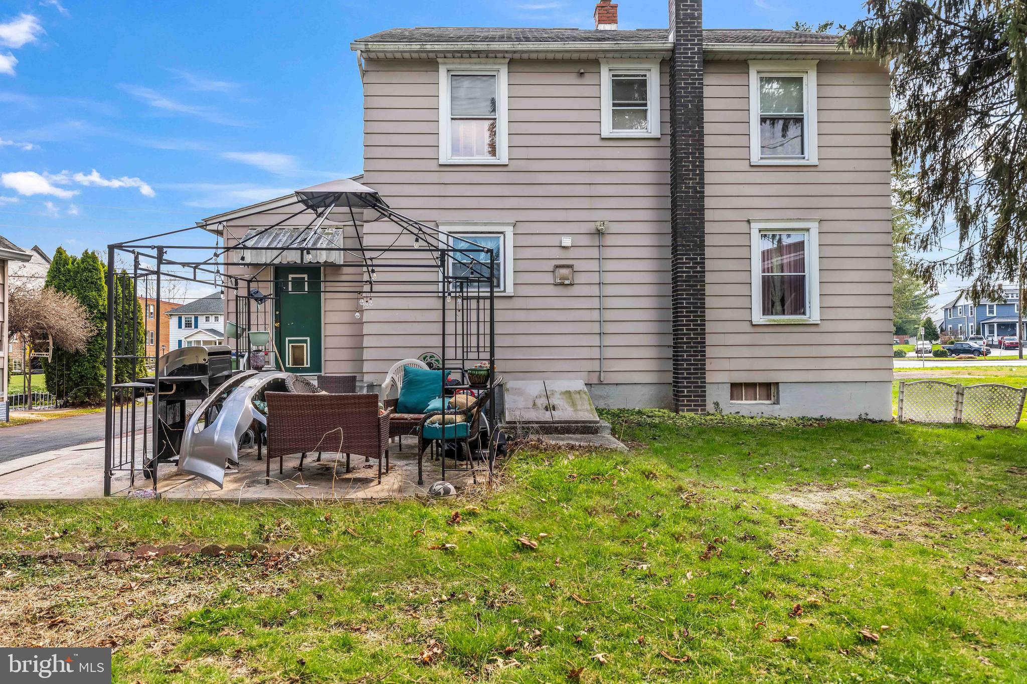 136 Linglestown Road Harrisburg, PA 17110 - Photo 24 of 25 a backyard of a house with table and chairs