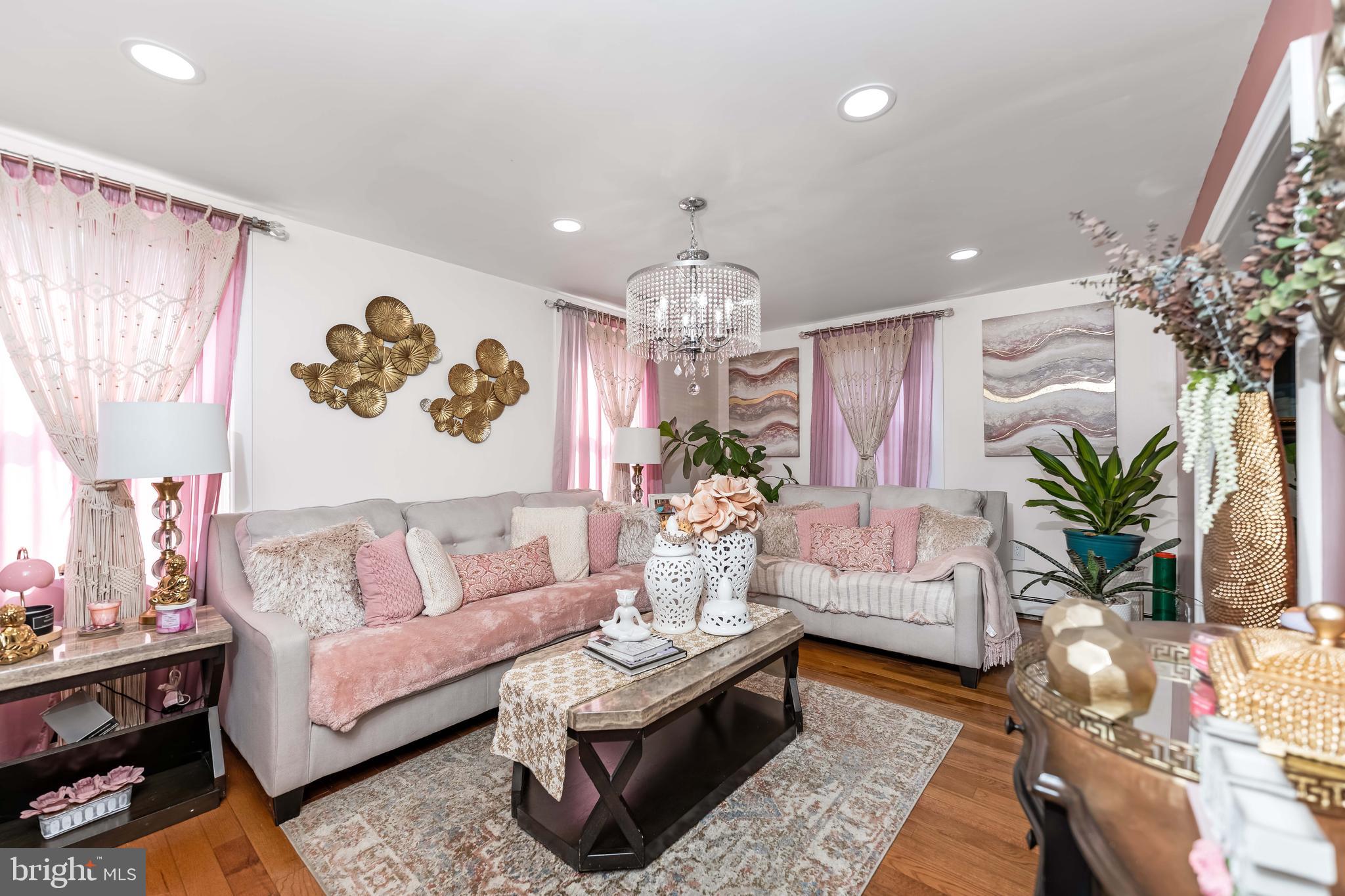 136 Linglestown Road Harrisburg, PA 17110 - Photo 3 of 25 a living room with furniture and a chandelier