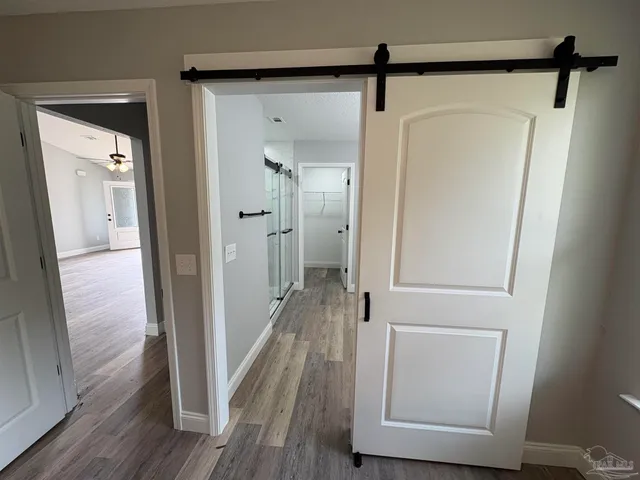 a view of a room with racks on the wall