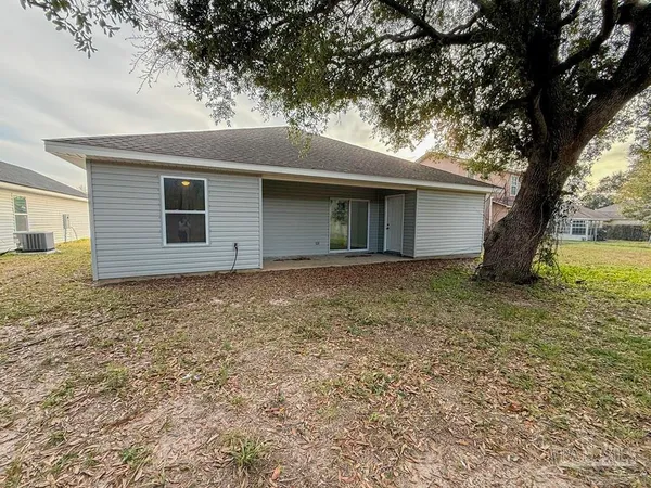 a house with trees in front of it