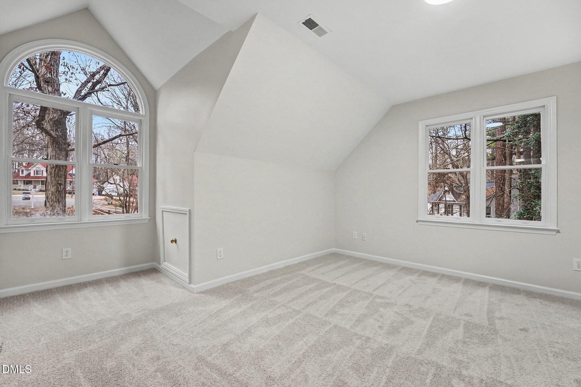 1005 Winsome Court Raleigh, NC 27603 - Photo 18 of 20 an empty room with windows