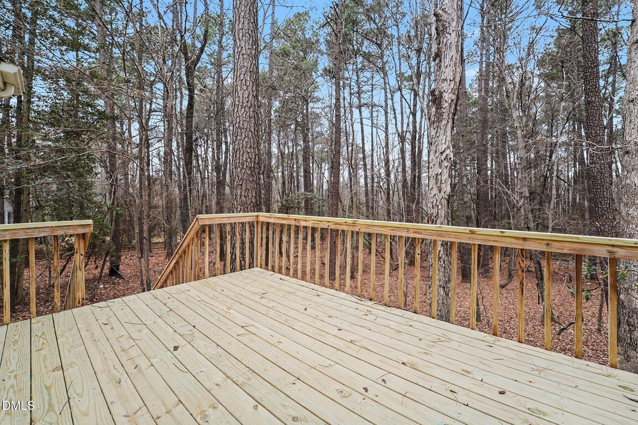 1005 Winsome Court Raleigh, NC 27603 - Photo 20 of 20 a view of balcony with wooden floor and fence