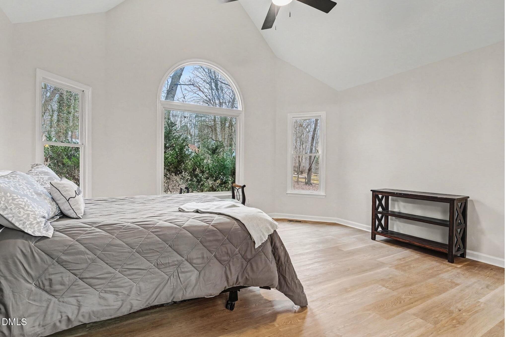 1005 Winsome Court Raleigh, NC 27603 - Photo 9 of 20 a bedroom with a bed and a window
