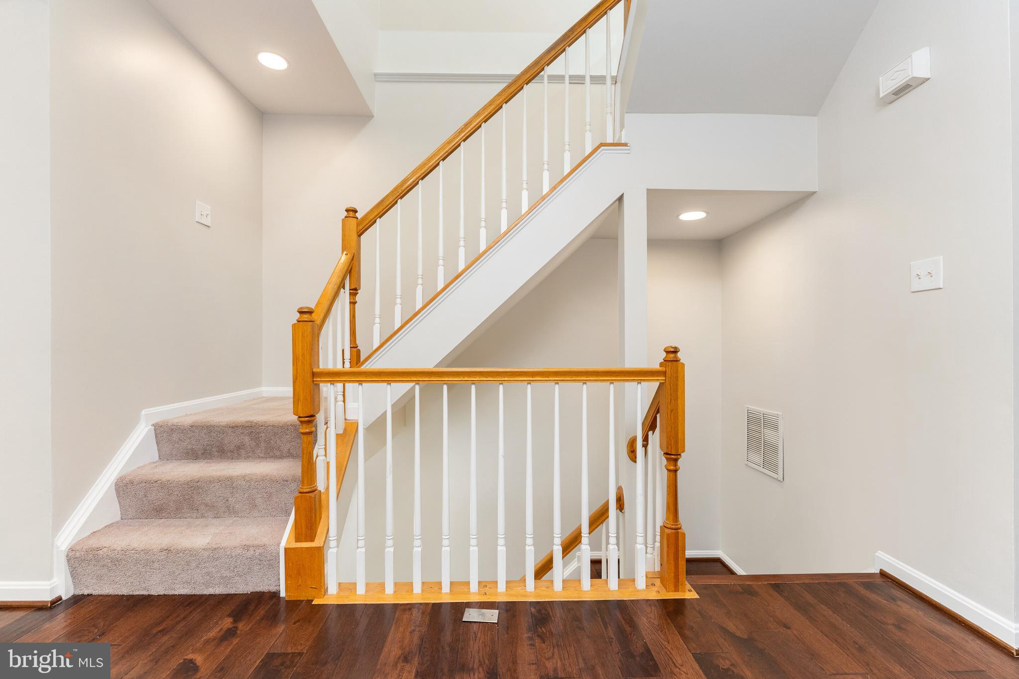5311 Yellow Turtle Place Woodbridge, VA 22193 - Photo 11 of 36 a view of entryway and hall with wooden floor