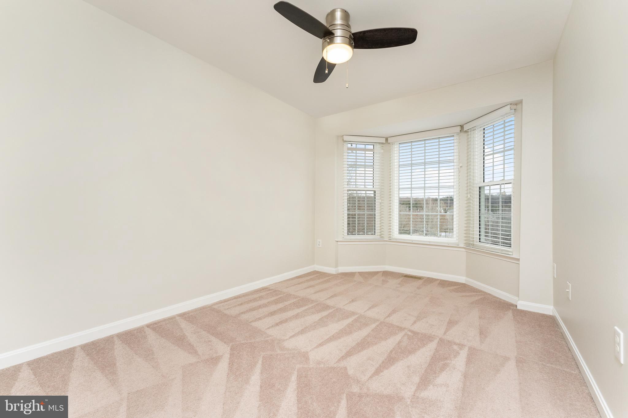 5311 Yellow Turtle Place Woodbridge, VA 22193 - Photo 22 of 36 a view of an empty room with a window