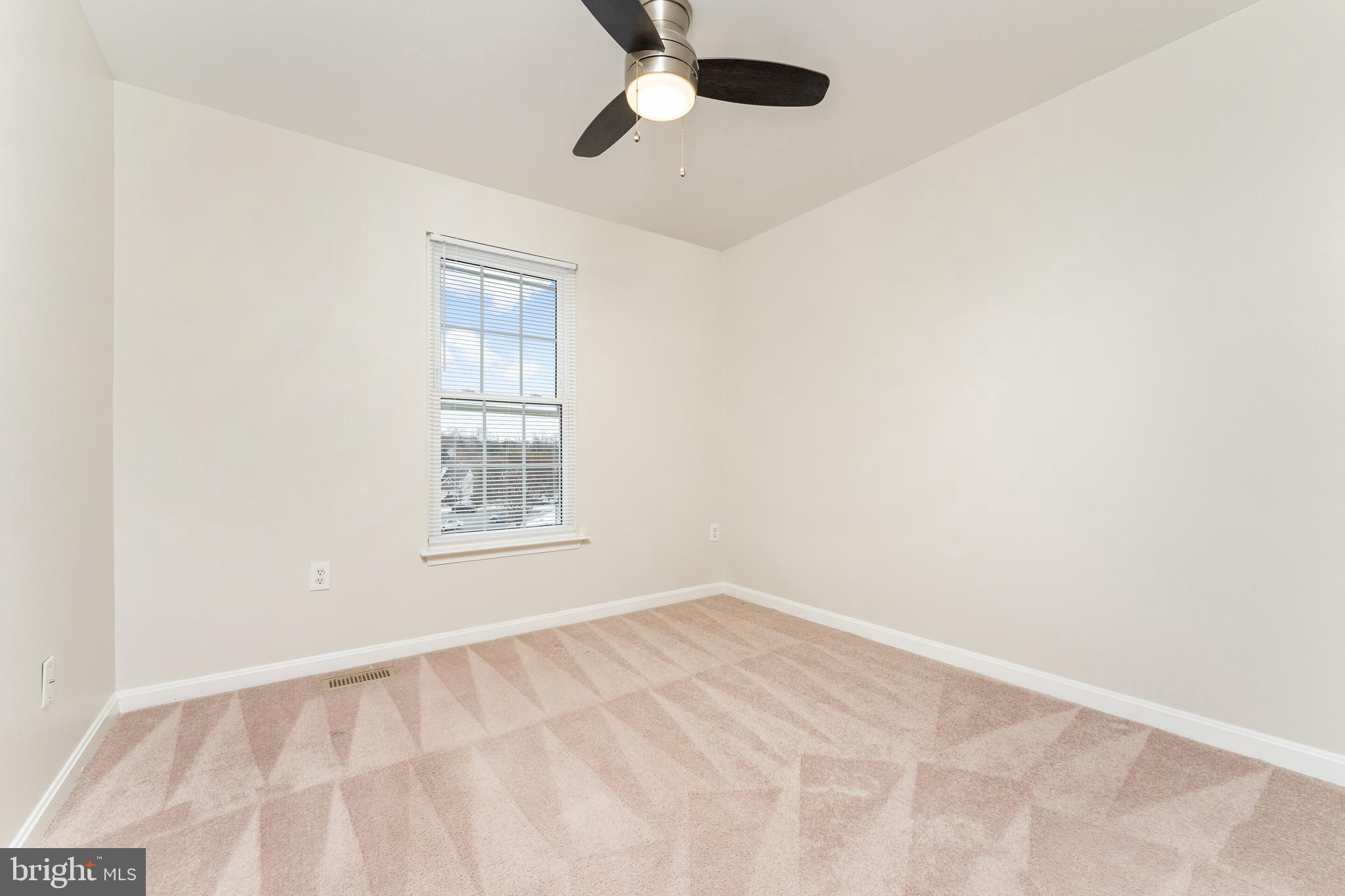 5311 Yellow Turtle Place Woodbridge, VA 22193 - Photo 24 of 36 a view of an empty room with a window