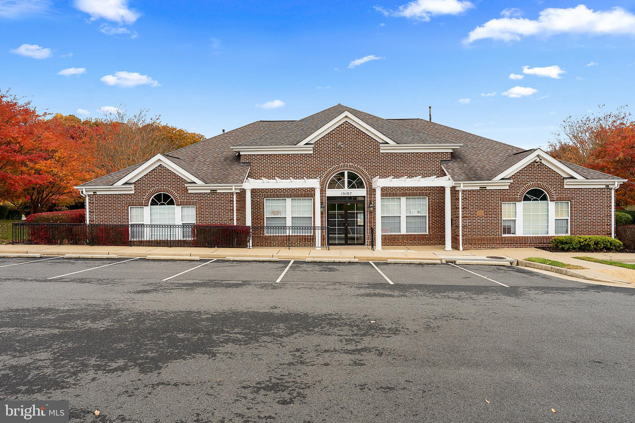 5311 Yellow Turtle Place Woodbridge, VA 22193 - Photo 31 of 36 a front view of a house with a yard