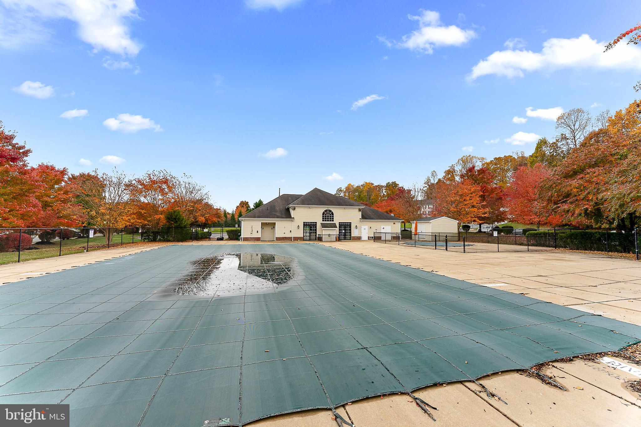 5311 Yellow Turtle Place Woodbridge, VA 22193 - Photo 32 of 36 a view of an outdoor space and swimming pool