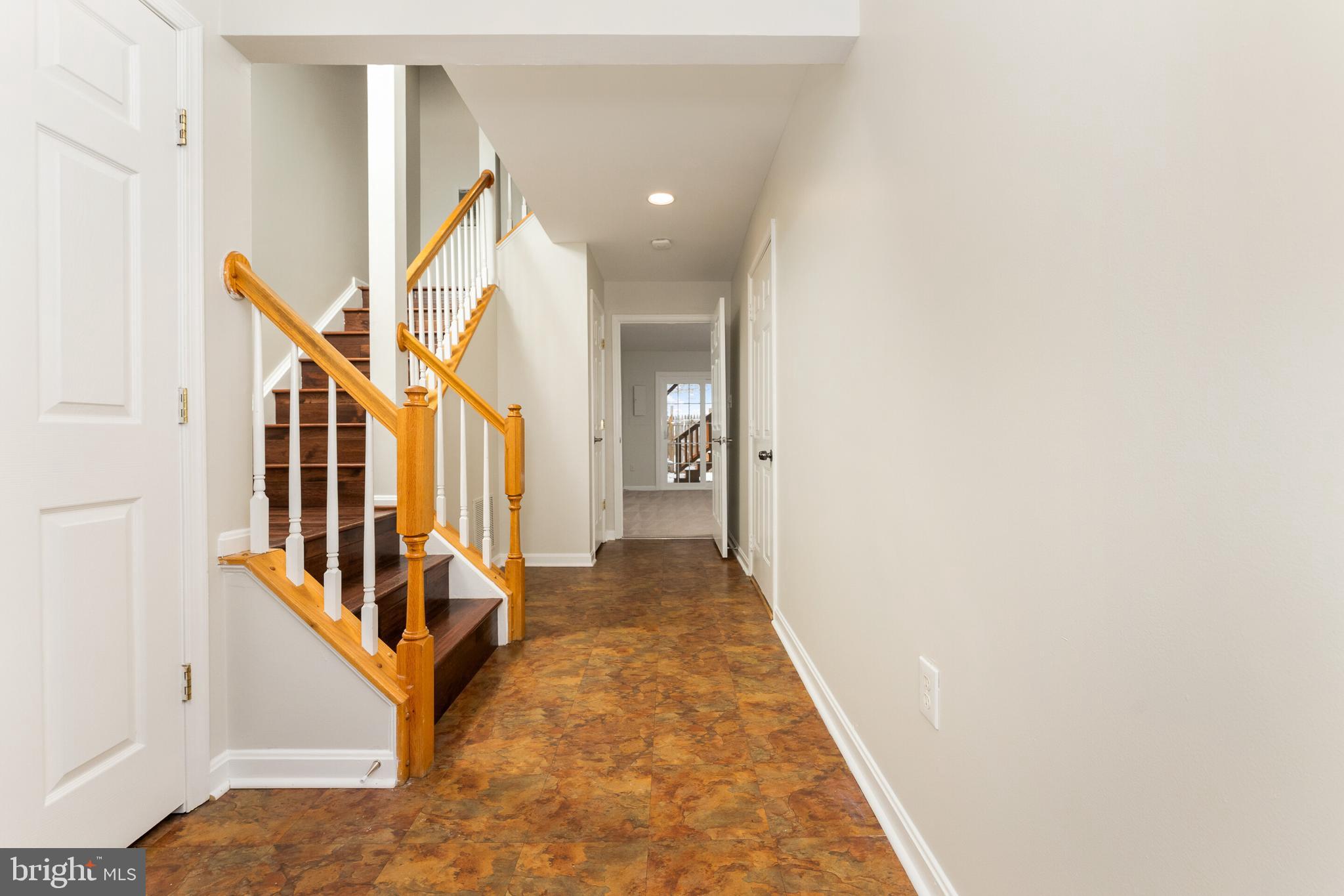 5311 Yellow Turtle Place Woodbridge, VA 22193 - Photo 6 of 36 a view of a hallway with staircase