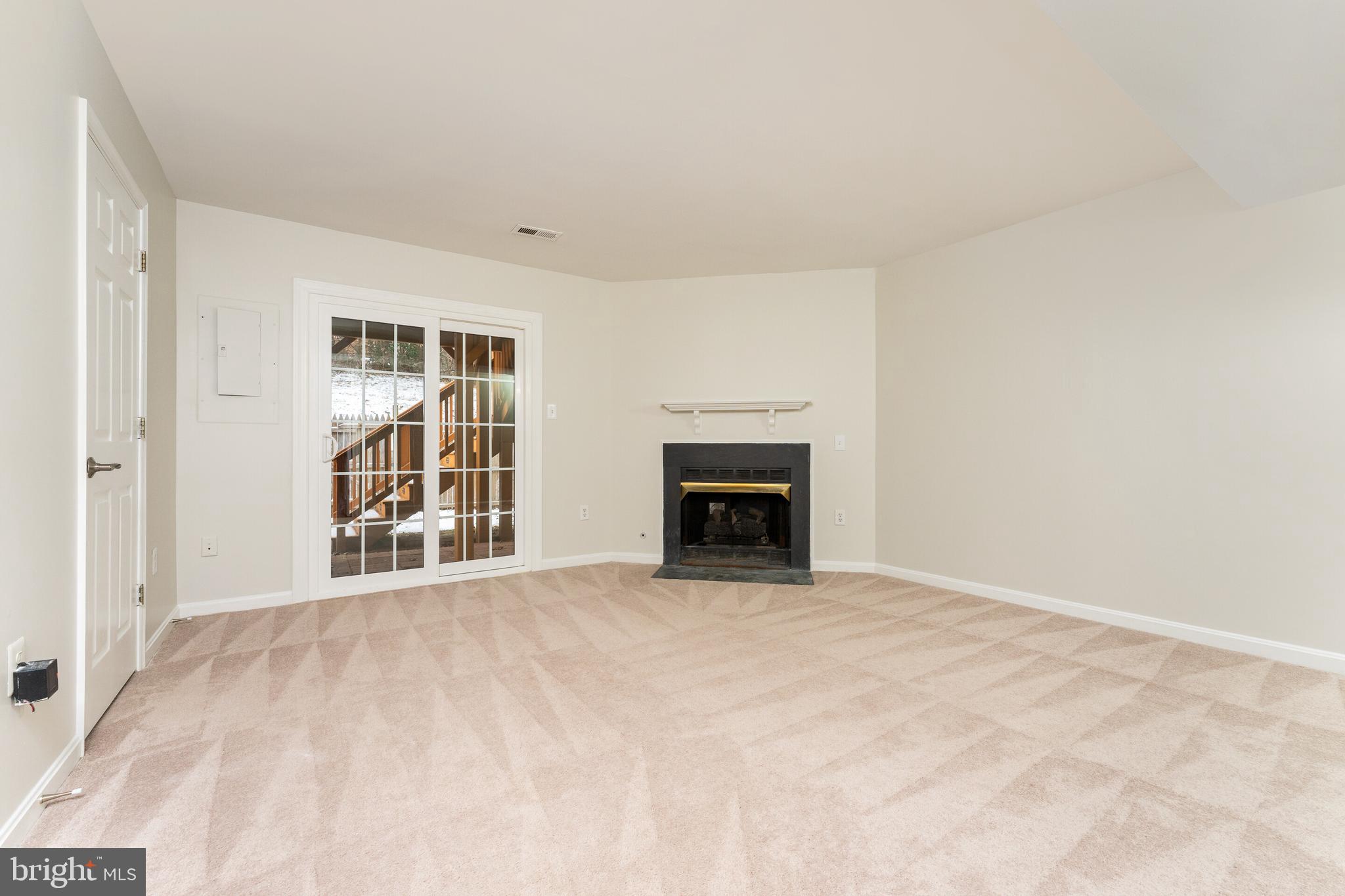 5311 Yellow Turtle Place Woodbridge, VA 22193 - Photo 8 of 36 an empty room with windows