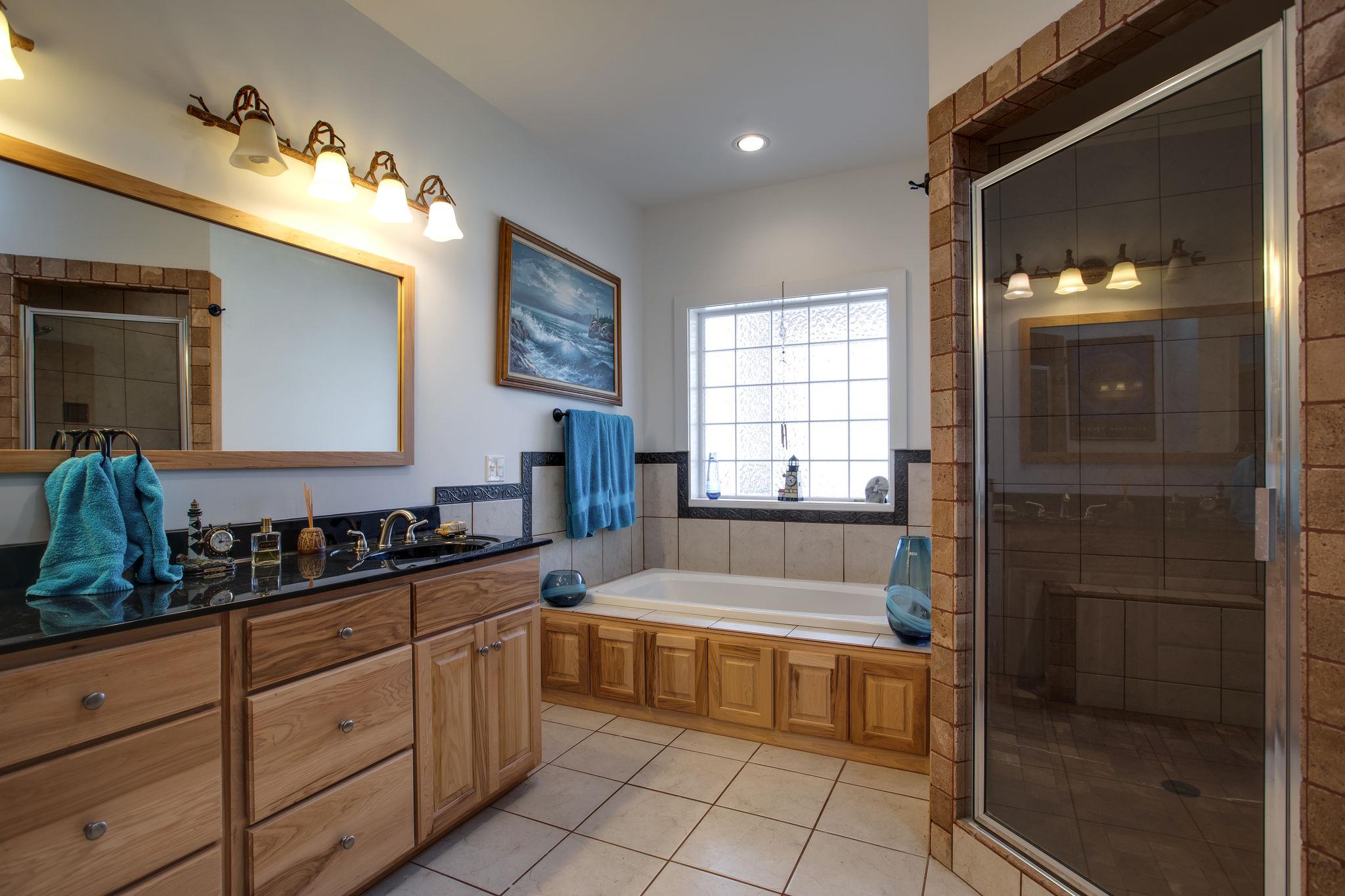 5150 Jefferson Road Smithville, TN 37166 - Photo 14 of 29 The Bathroom even has heated tile floors, so you'll never have to step on to a cold bathroom floor!