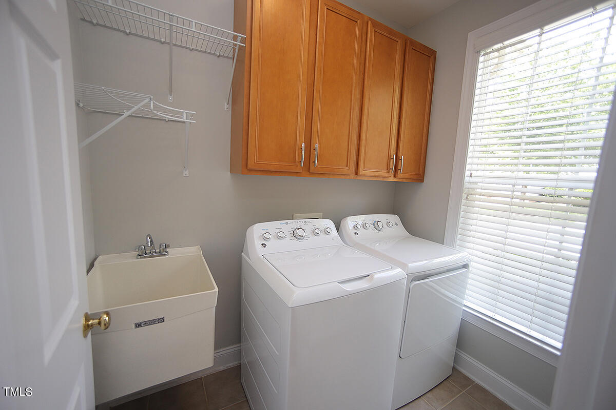 9511 Dellbrook Court Raleigh, NC 27617 - Photo 21 of 37 Laundry Room on Main