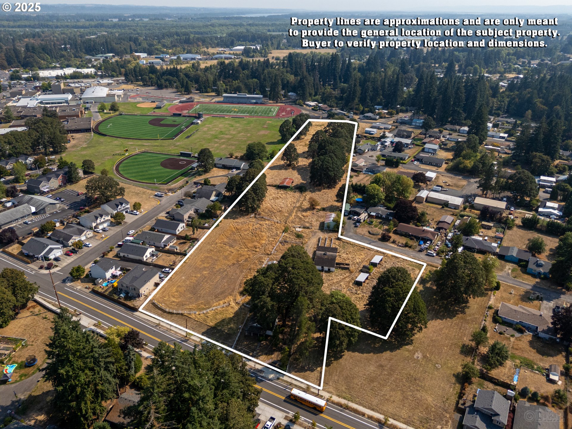 2675 Gable Road St. Helens, OR 97051 - Photo 1 of 10 an aerial view of a tennis ground and a cars park side of the road