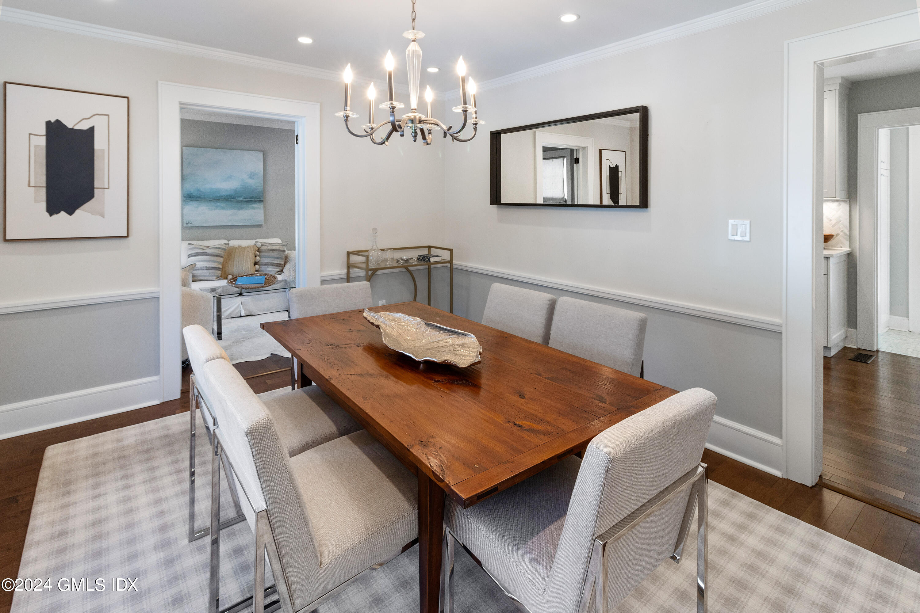 93 Valleywood Road Cos Cob, CT 06807 - Photo 5 of 22 a view of a dining room with furniture and wooden floor