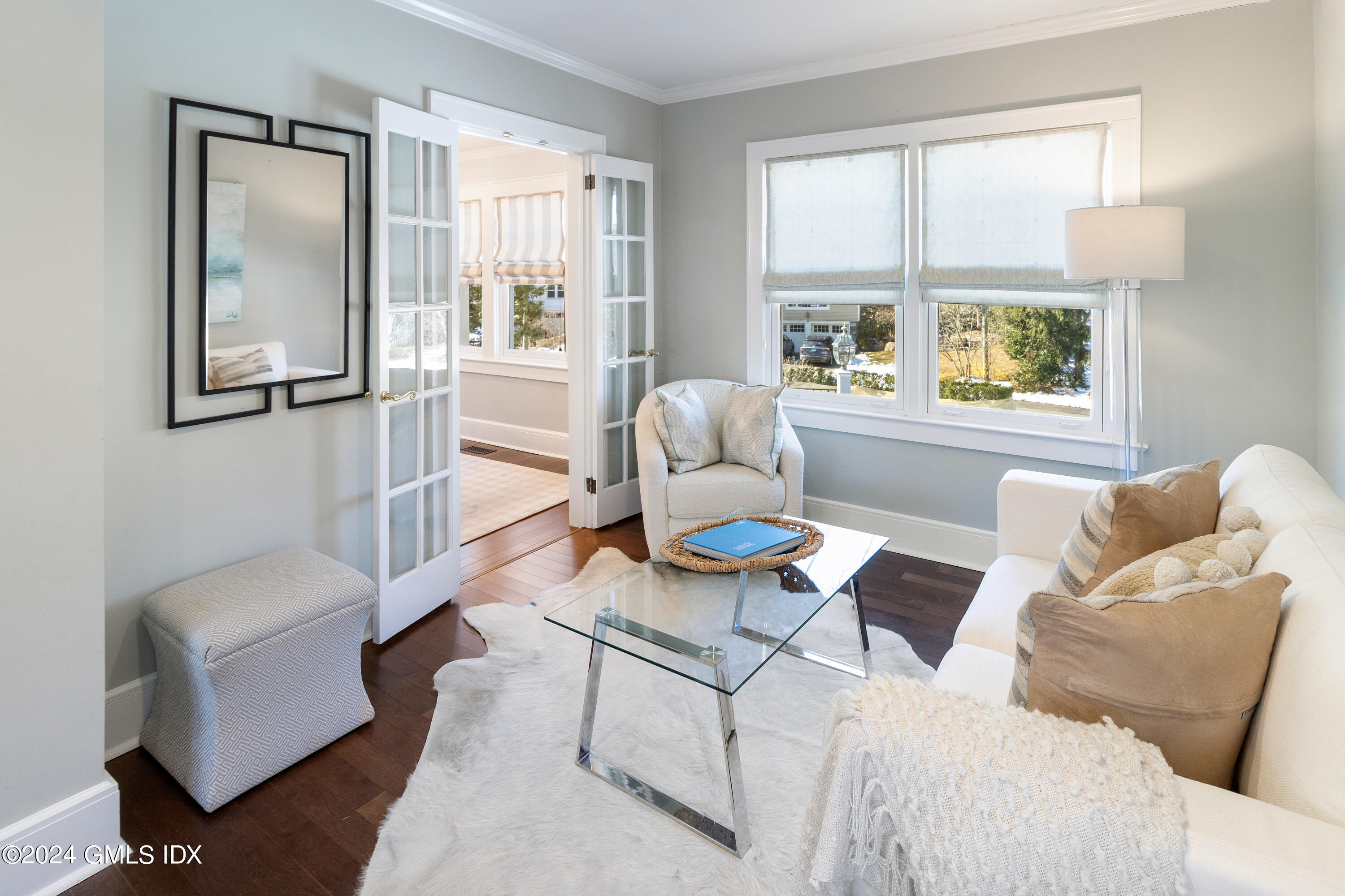 93 Valleywood Road Cos Cob, CT 06807 - Photo 6 of 22 a living room with furniture and a window
