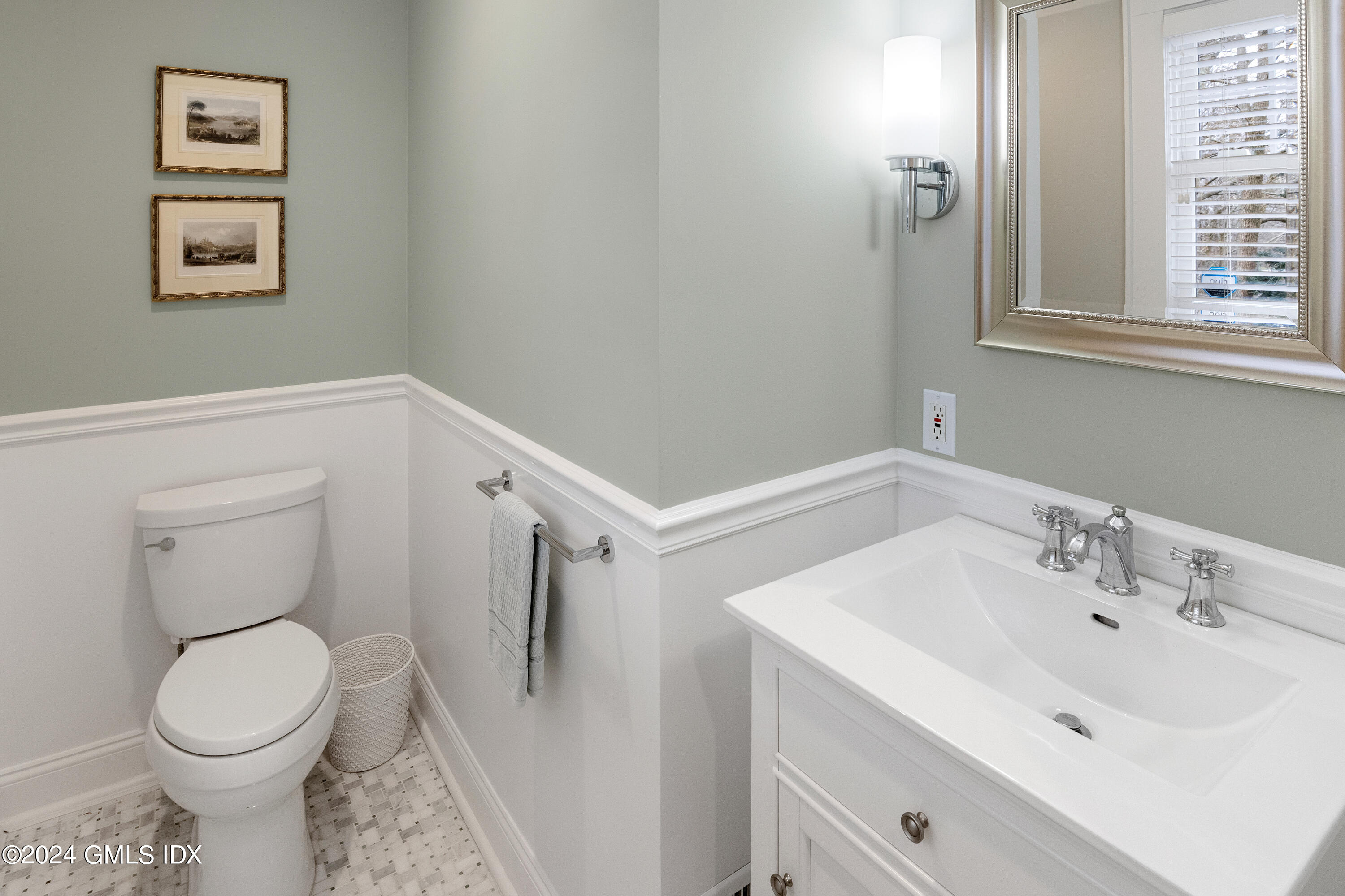 93 Valleywood Road Cos Cob, CT 06807 - Photo 9 of 22 a bathroom with a sink mirror and toilet