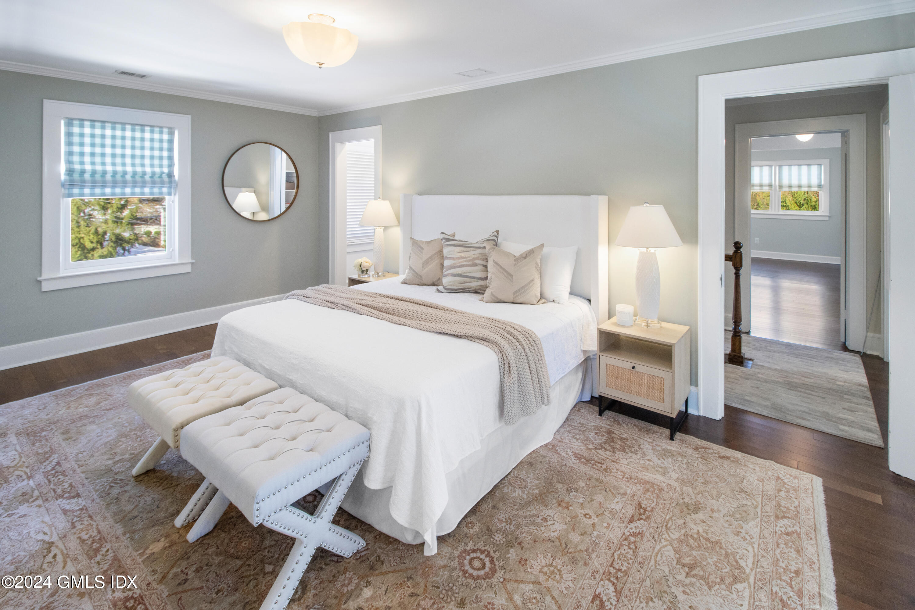 93 Valleywood Road Cos Cob, CT 06807 - Photo 10 of 22 a bedroom with a bed and a window