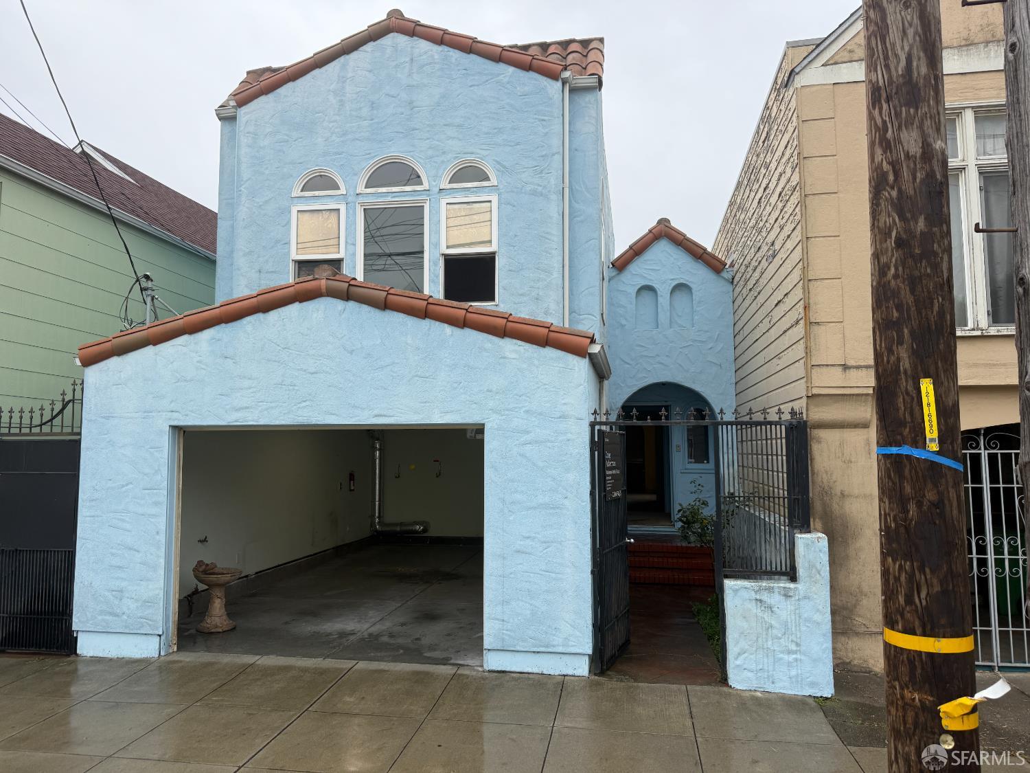a front view of a house with a garage