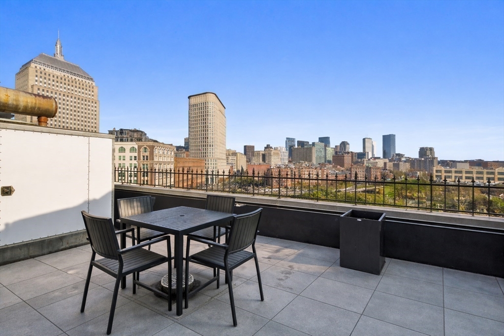 75 Clarendon Street, Unit 201 Boston, MA 02116 - Photo 10 of 12 a city view with a seating space