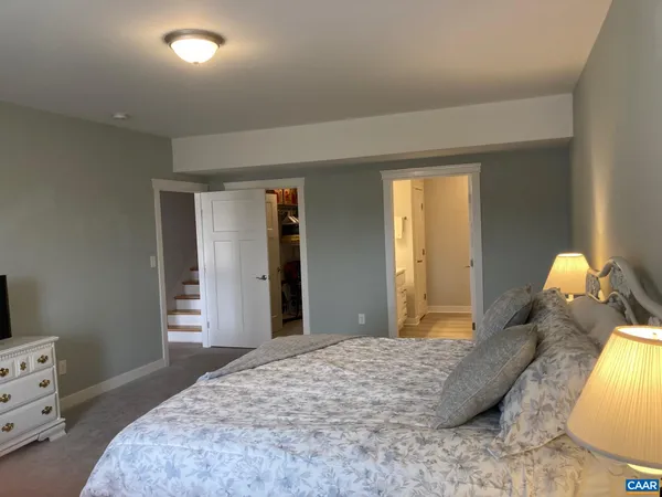 a picture of a bathroom with a shower