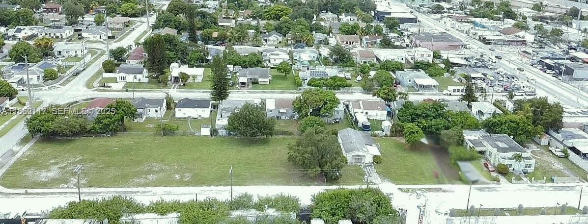 759 Northwest 73rd Street Miami, FL 33150 - Photo 4 of 9 an aerial view of residential houses with outdoor space and swimming pool