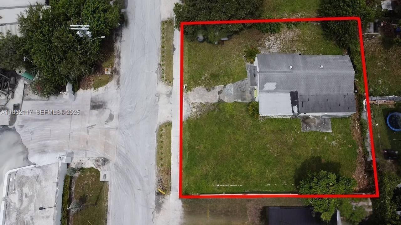 759 Northwest 73rd Street Miami, FL 33150 - Photo 7 of 9 a view of a small yard