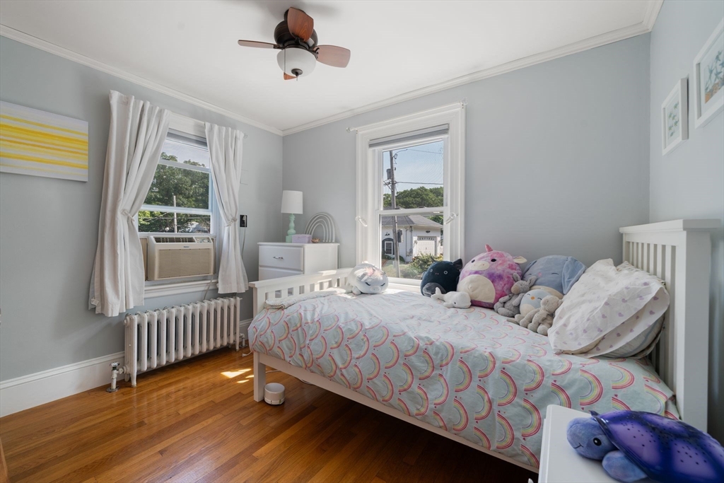 10 Parkview Road Reading, MA 01867 - Photo 24 of 31 a bedroom with a bed and a window