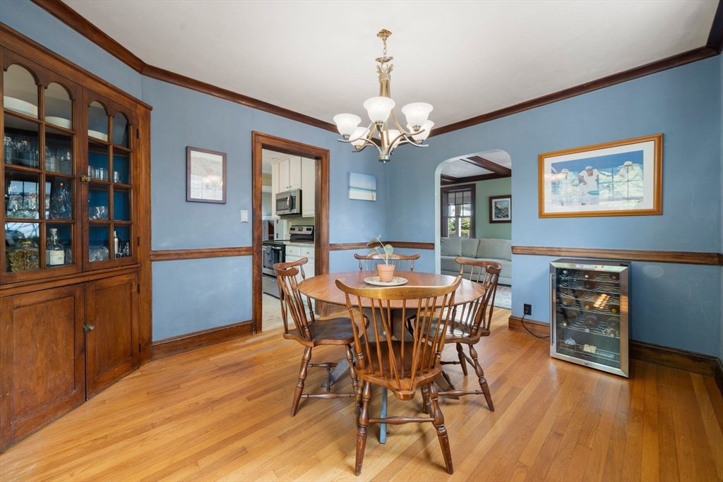 10 Parkview Road Reading, MA 01867 - Photo 9 of 31 a view of a dining room with furniture wooden floor and chandelier