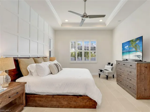 a spacious bathroom with a granite countertop bathtub shower sink and toilet