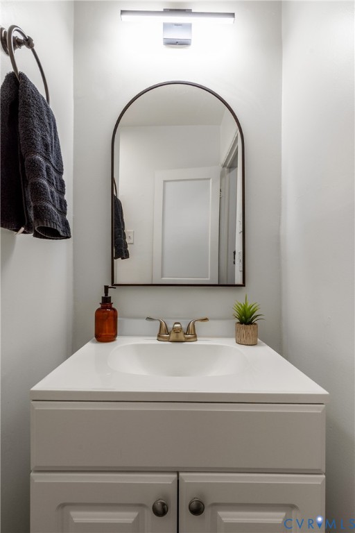 3406 Meadowbridge Road Richmond, VA 23222 - Photo 23 of 41 a bathroom with a sink and a mirror