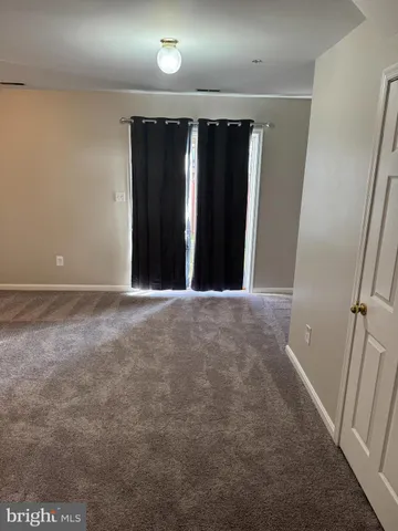 a view of hallway with shower