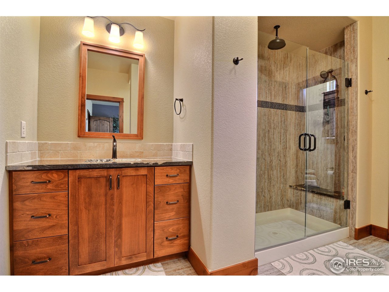 1440 Red Tail Road Eaton, CO 80615 - Photo 16 of 40 Large Shower and Separate Sink Vanities